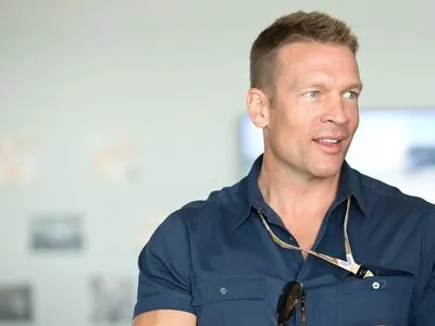 Geoffrey "Jeff" Buss in conversation at the 2014 US Grand Prix